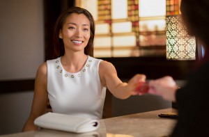 Woman receives a Pechanga Rewards card 